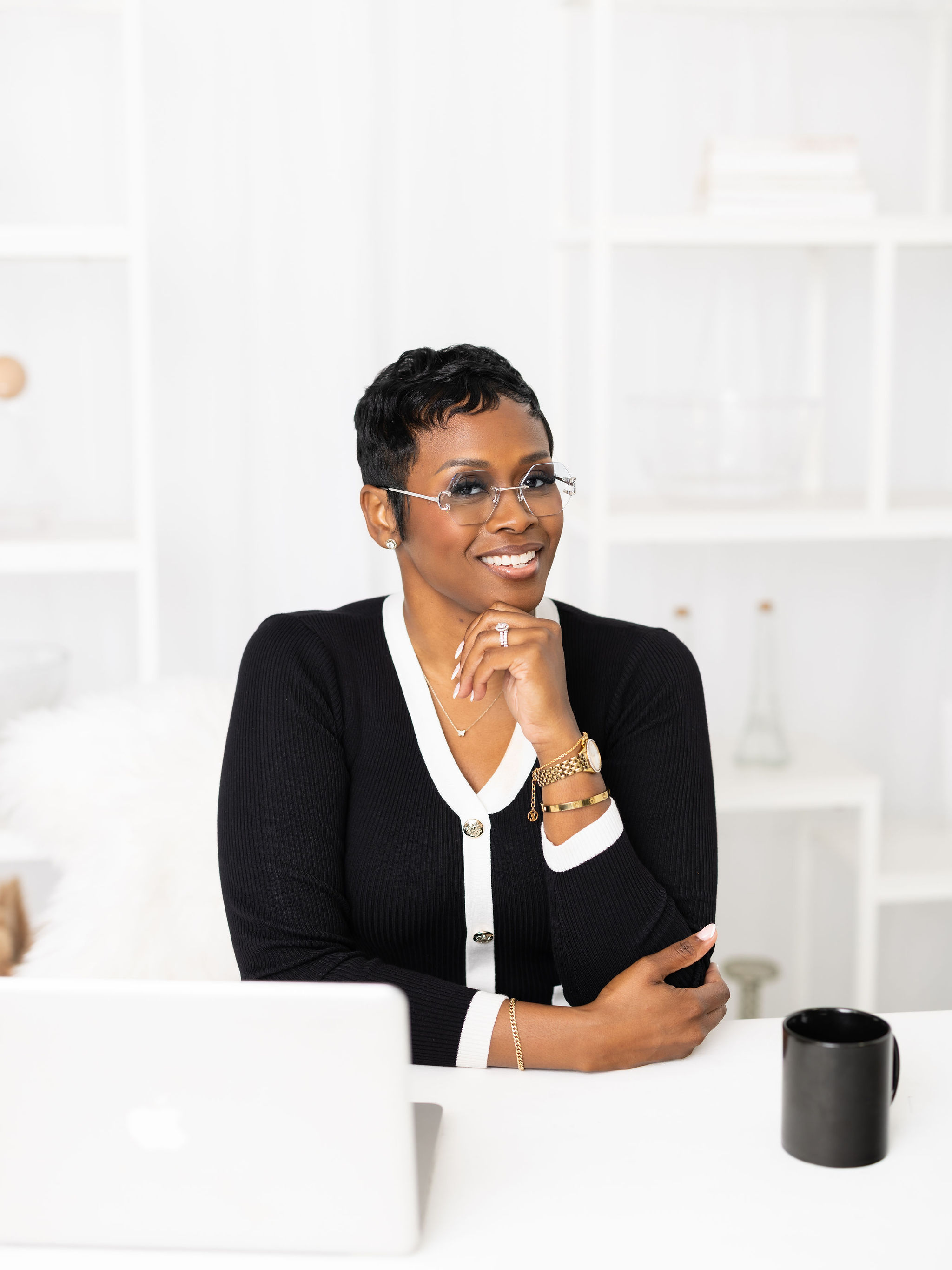 Autumn R. Russell smiling at her desk