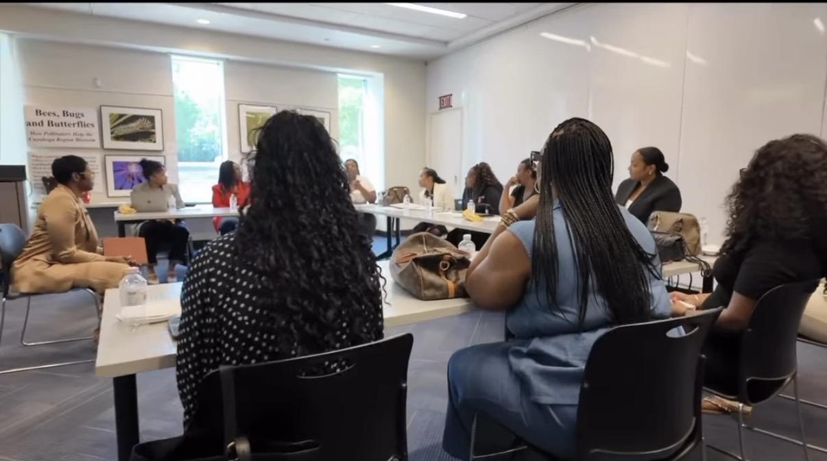 A full room participating in a facilitated group conversation with Autumn R. Russell